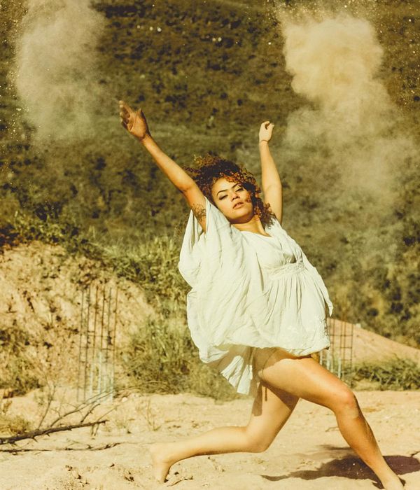 Woman in active motion feeling energetic and vibrant